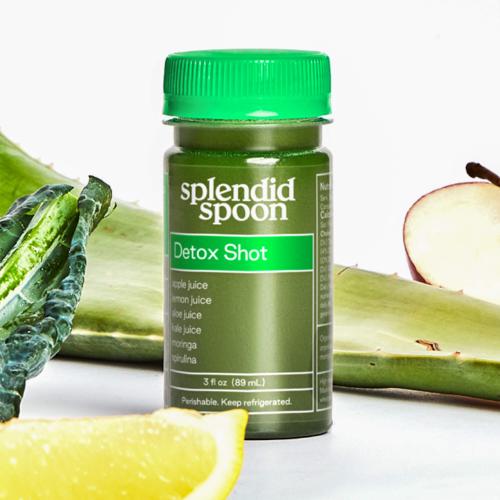 Detox Shot surrounded by its ingredients