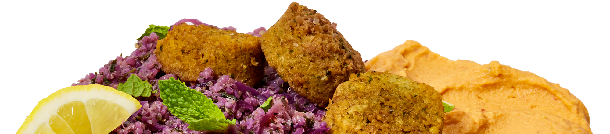 Three falafels seen in profile sitting on a bed of purple grains. To the right is mashed sweet potatoe, which are pale orange.