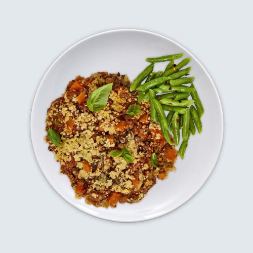 Hearty Vegetable Bolognese as seen from above in a white bowl on a white background