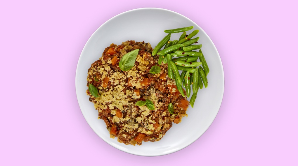 Hearty Vegetable Bolognese on a white plate as seen from above