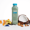 Blue Majik smoothie surrounded by its ingredients: sea buckthorn berry, bananas, blue spirulina, vanilla, almonds, coconuts, and dates