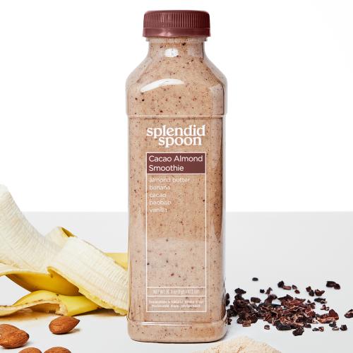 Cacao Almond Smoothie on a white background with banana, almonds, baobab powder, cacao nibs 