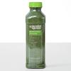 Bottle of power greens on a white background